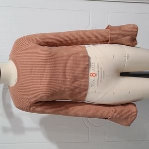Cropped nude sweater with wide cuffs